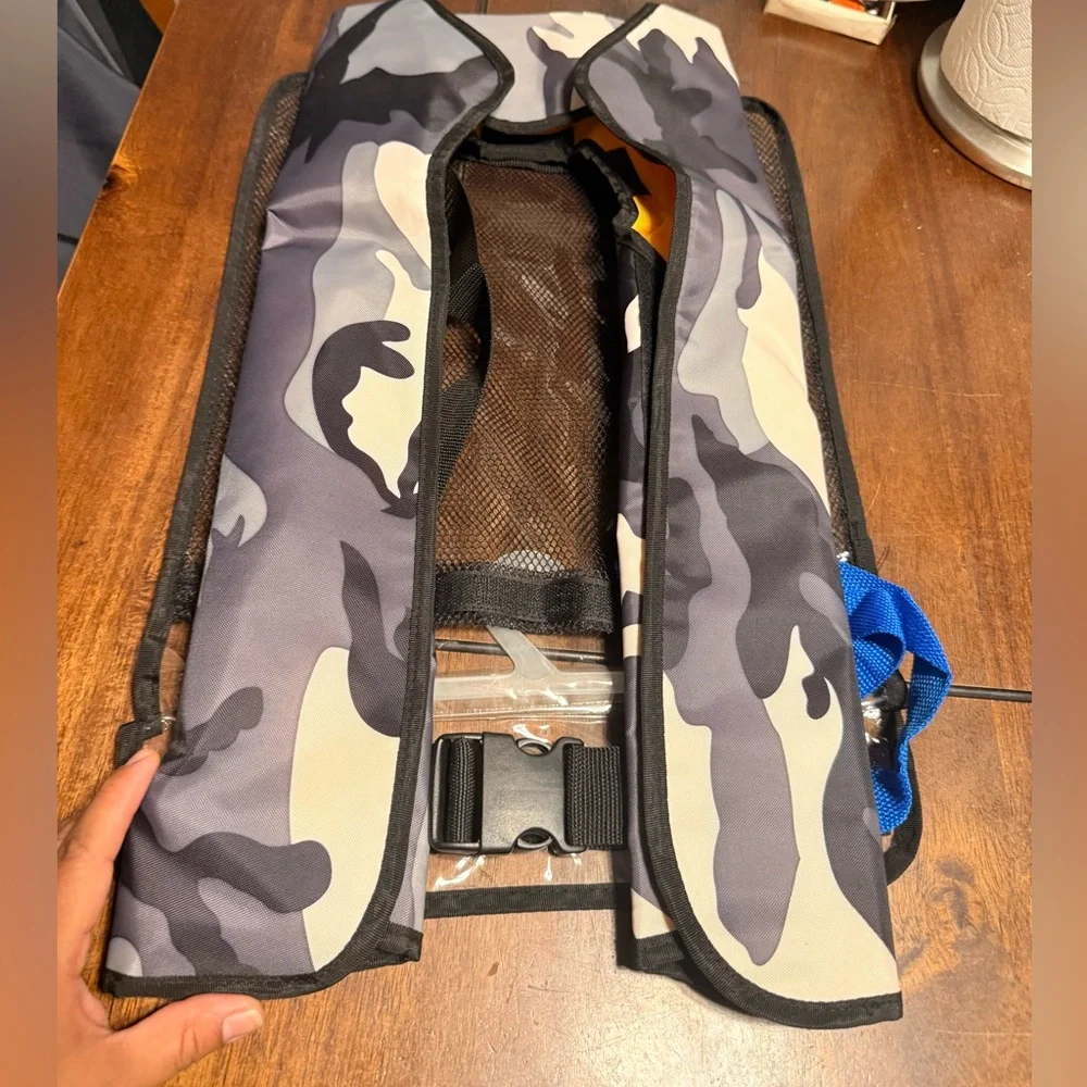 Water sports emergency self inflatable vest